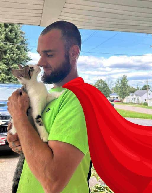Man holding a cat