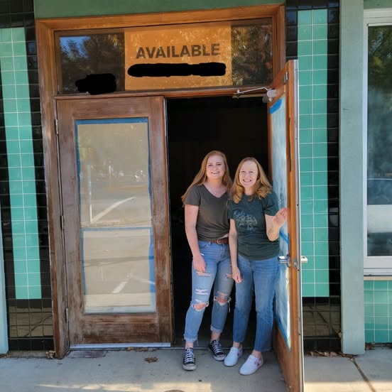 Two ladies in doorway